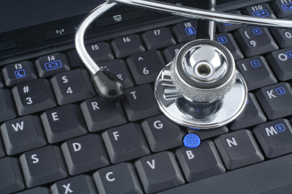 laptop and stethoscope Royalty Free Stock Photo